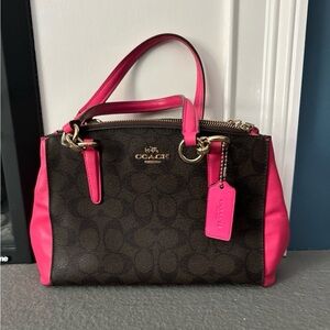 Pink and brown coach handbag